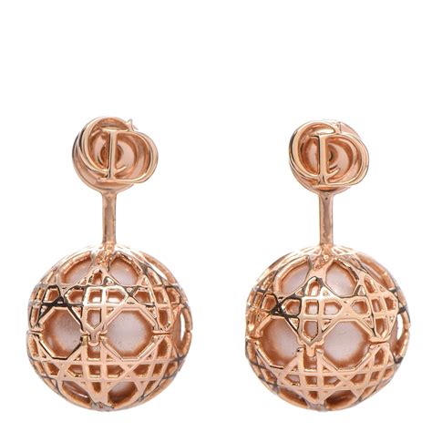 dior cannage tribal earrings|Dior pearl earrings.